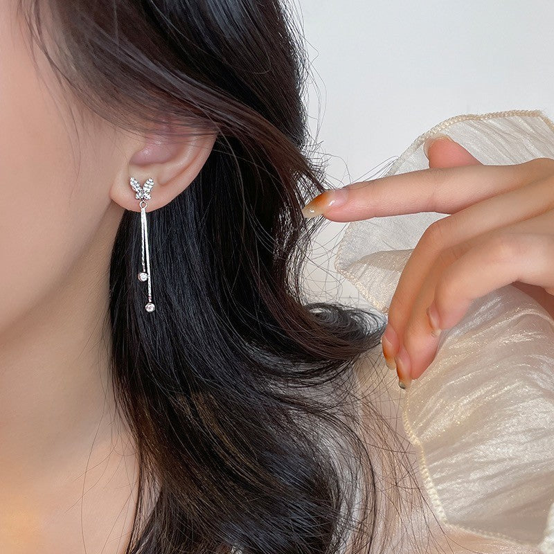 Wholesale Temperament long round face slim galaxy tassel earrings