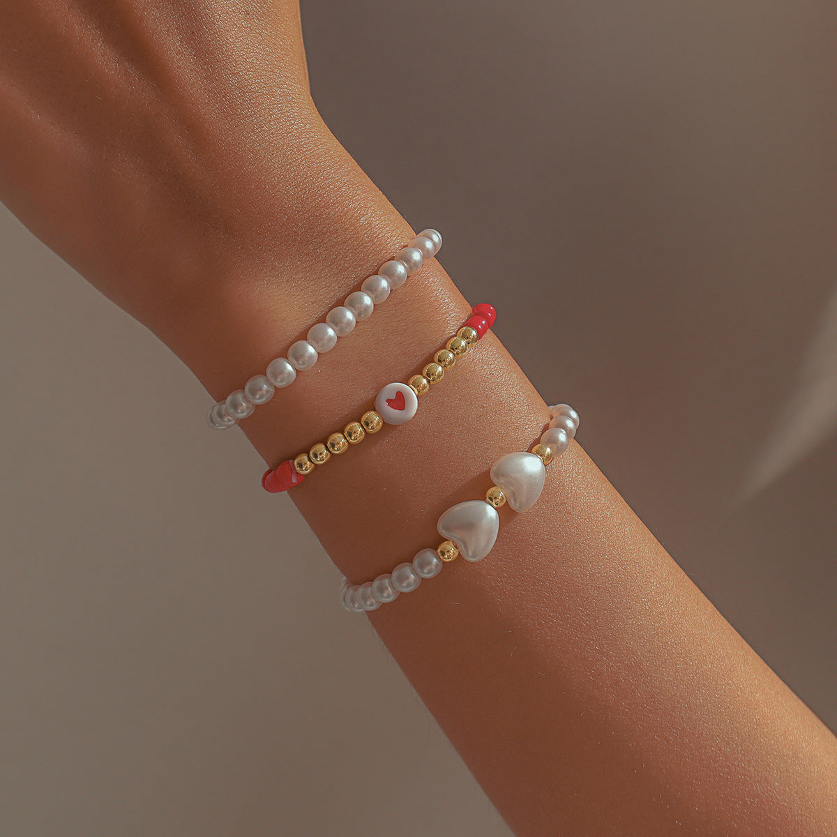 Brazalete del corazón del corazón geométrico de resina perla al por mayor