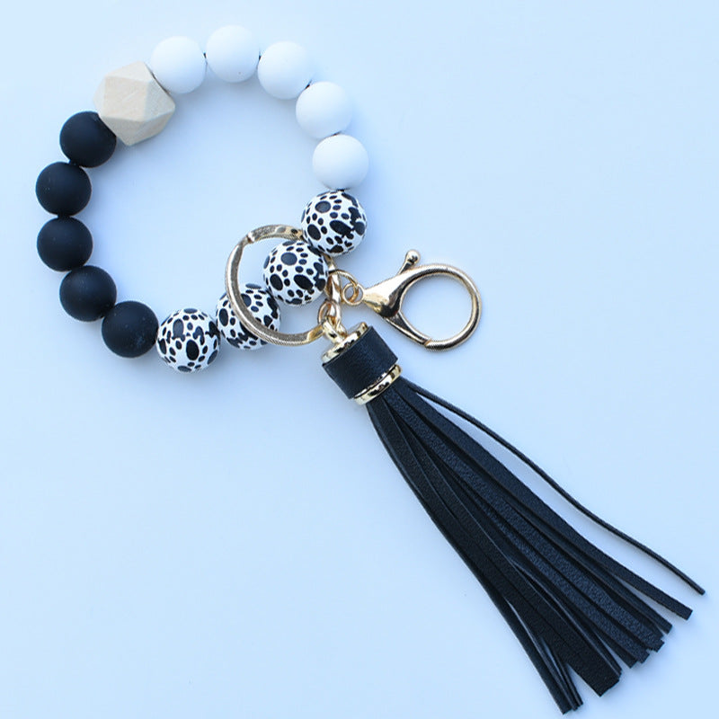 Wholesale Colorful leopard print silicone beaded bracelet keychain PU tassel pendant
