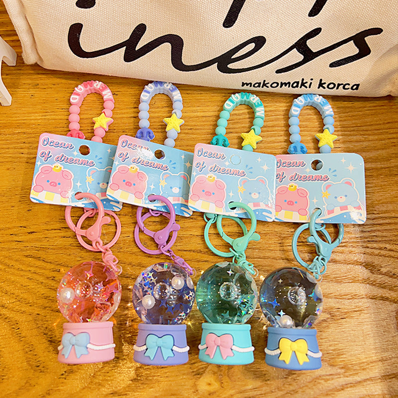 Cadena de llave acrílica de la bola de cristal del océano de sueño al por mayor