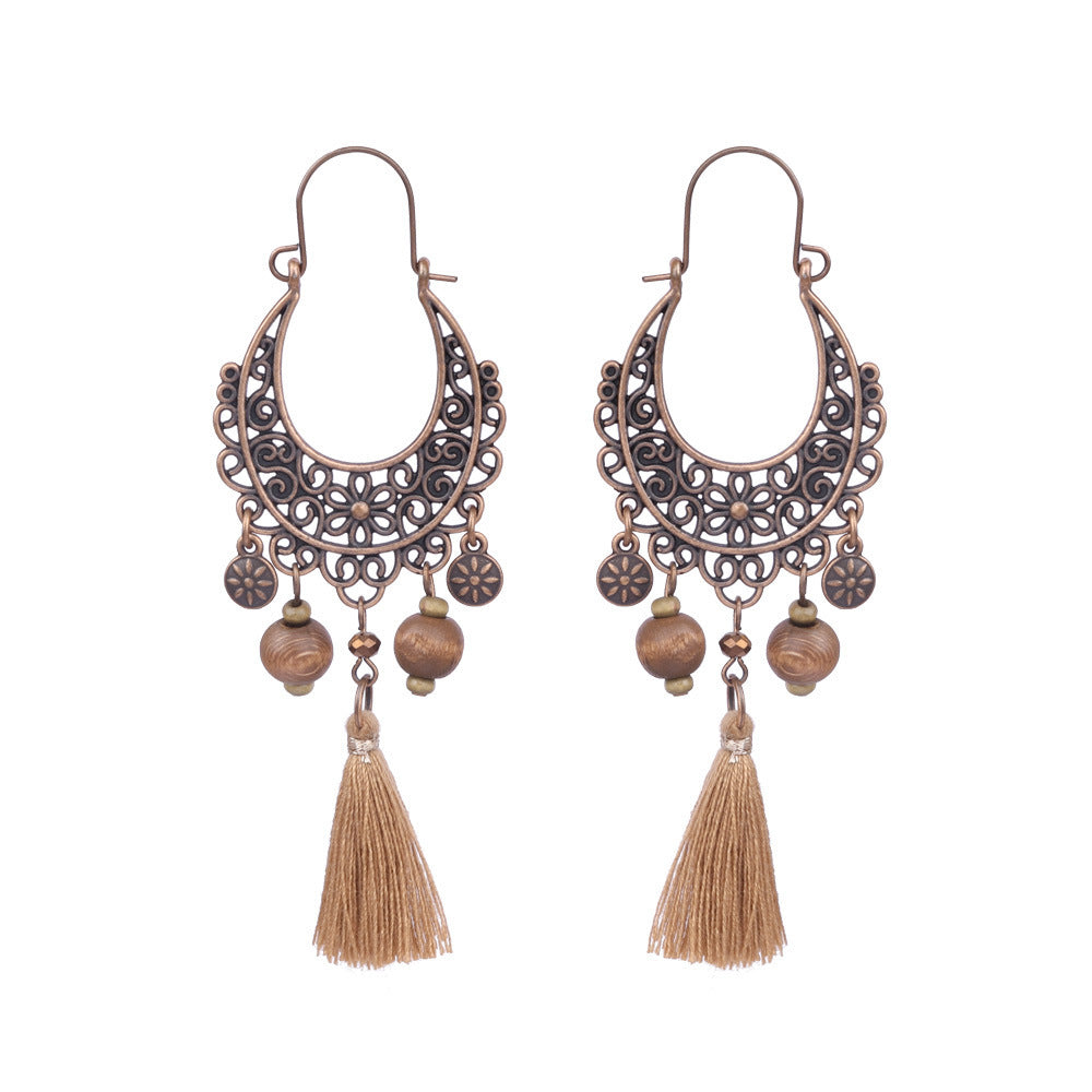 Wholesale Bohemian Rice Pearl Shell Long Tassel Earrings