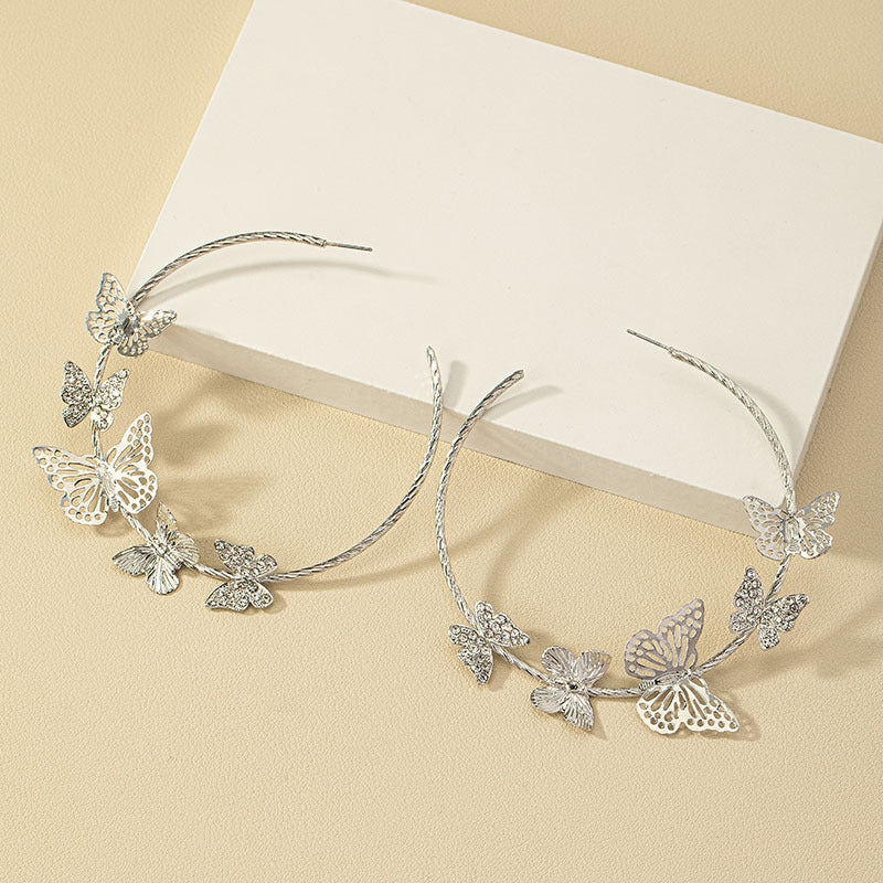 Pendientes de aleación de mariposas de diamantes al por mayor