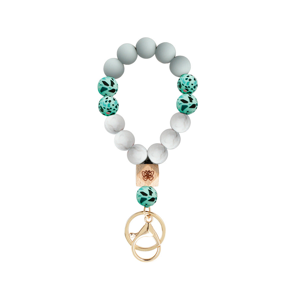 Wholesale Colorful tassel bead silicone wrist keychain