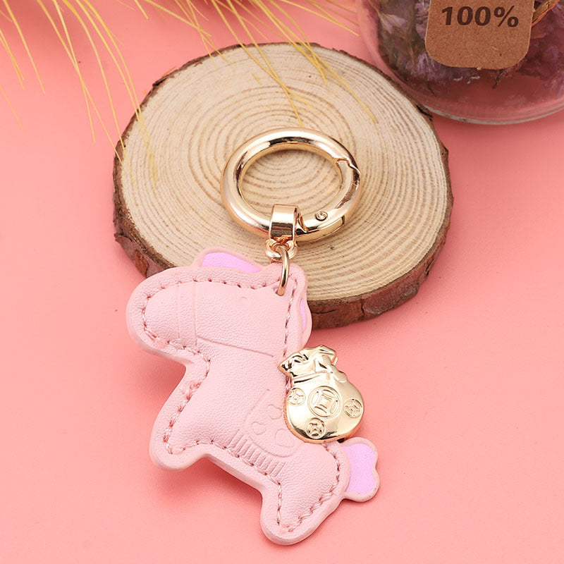 Wholesale Immediately get rich handmade cow leather car keychain pendant