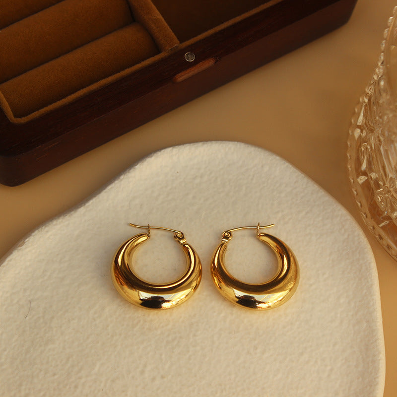 Wholesale Hollow Crescent Shaped Hollow Gold-plated Titanium Steel Earrings