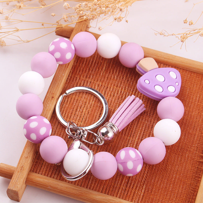 Wholesale Leather short tassel mushroom beaded bracelet keychain accessories