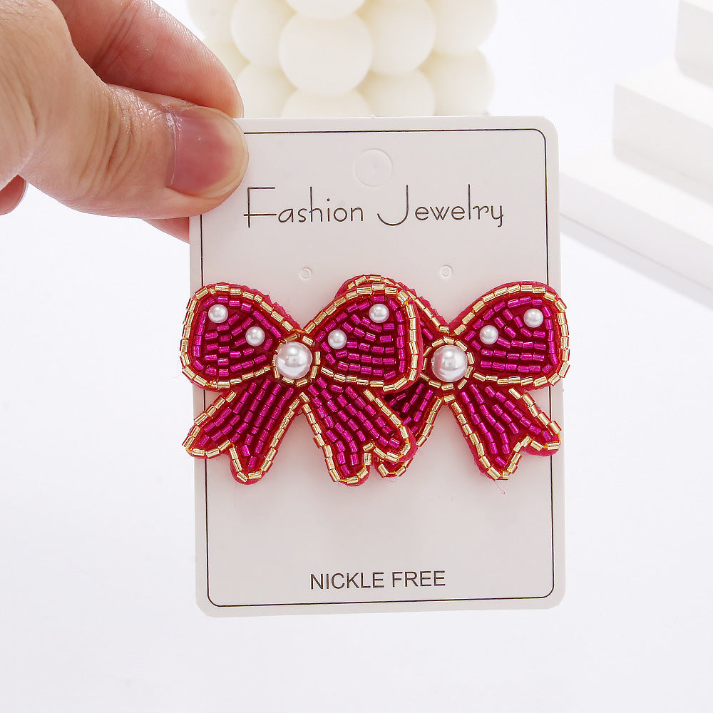 Wholesale Bohemian Holiday Style Bow Rice Beads Female Niche Versatile Simple Earrings