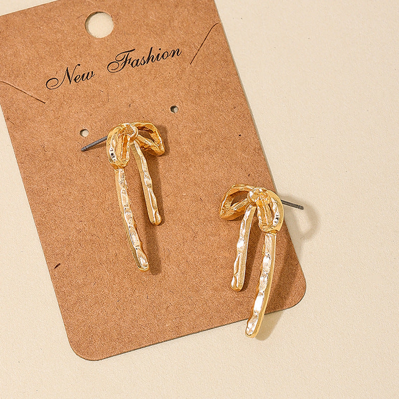 wholesale new INS metal style simple hollow bow earrings