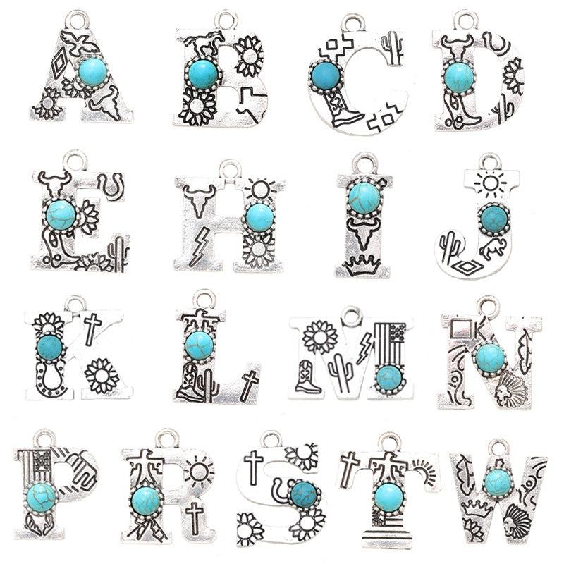 Wholesale of Western Wind Letter Natural Turquoise Alloy Letter Keychain Accessories