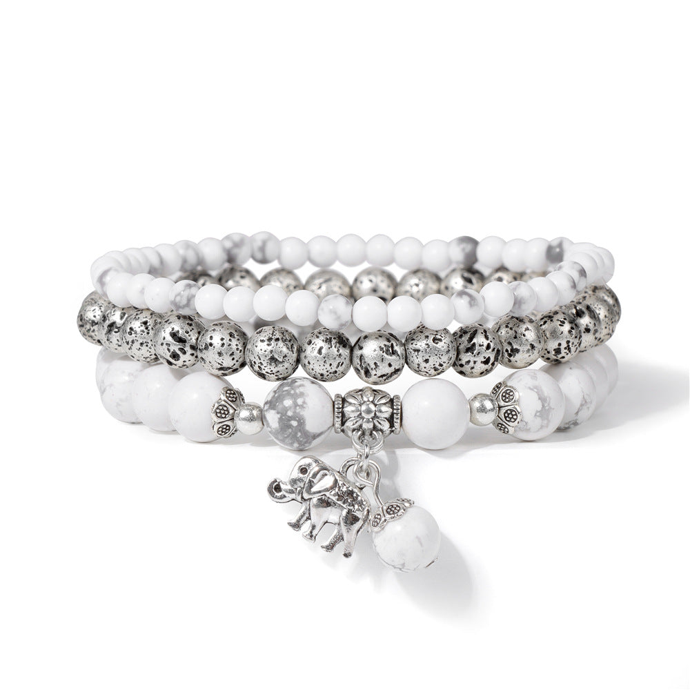 Cuentas de piedra natural al por mayor cuentas de piedra volcánica colgante de elefante de tres capas pulsera