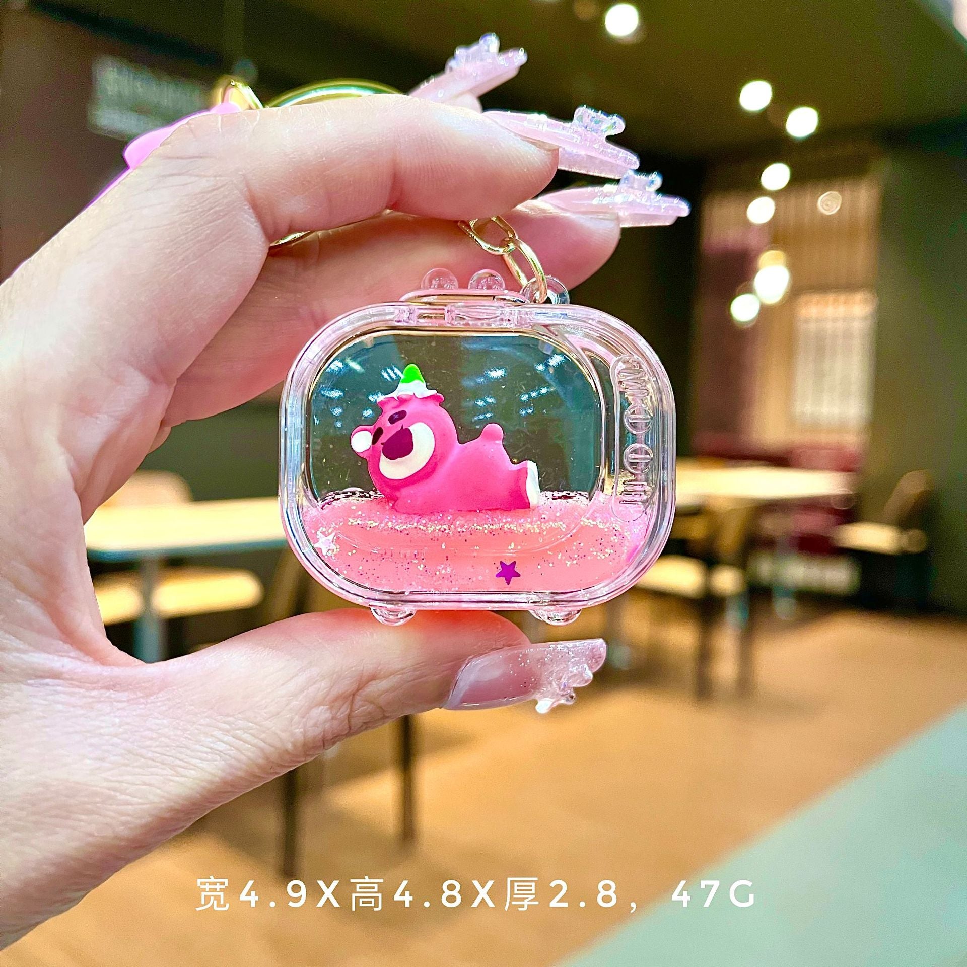Wholesale Oil filled pink strawberry bear quicksand Keychains