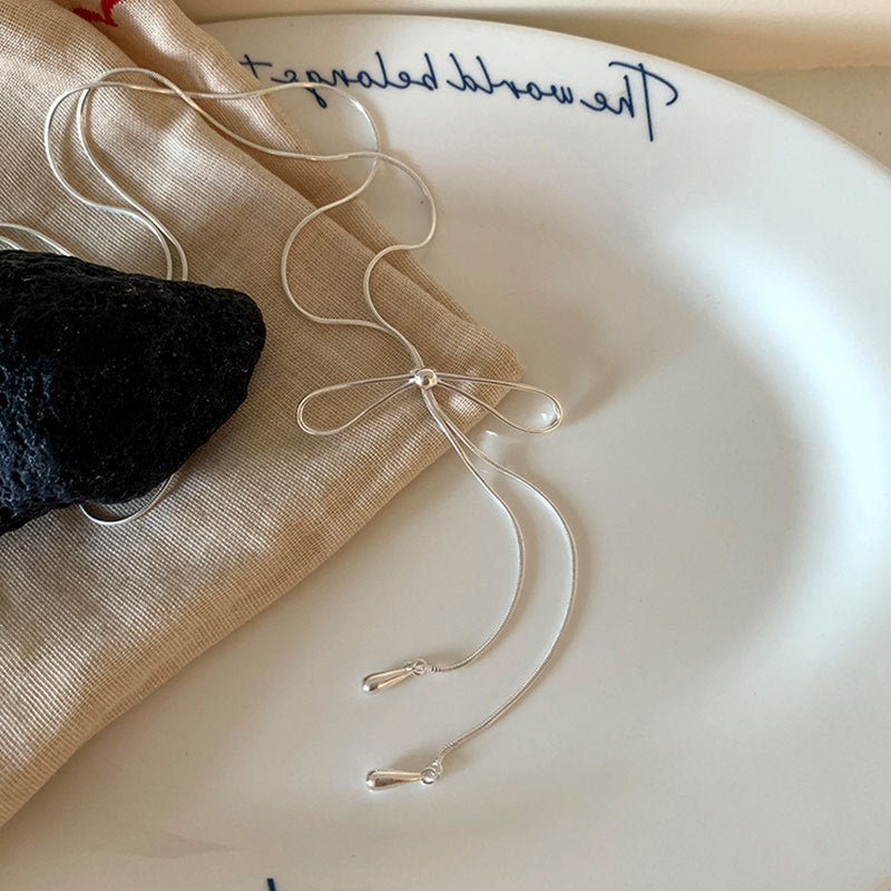 Wholesale Simple bow pull-out long necklace sweater chain