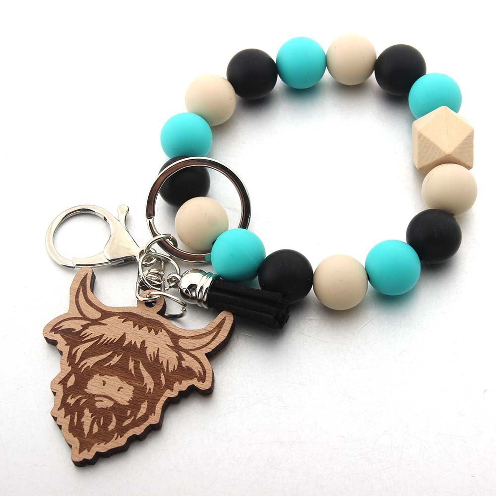 Wholesale Cartoon Western Cowboy Tassel Laser Bull Head Beaded Keychain