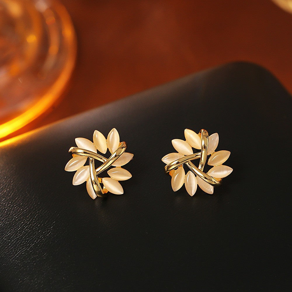 Wholesale Fireworks pearls cat eyes plant studded diamond earrings