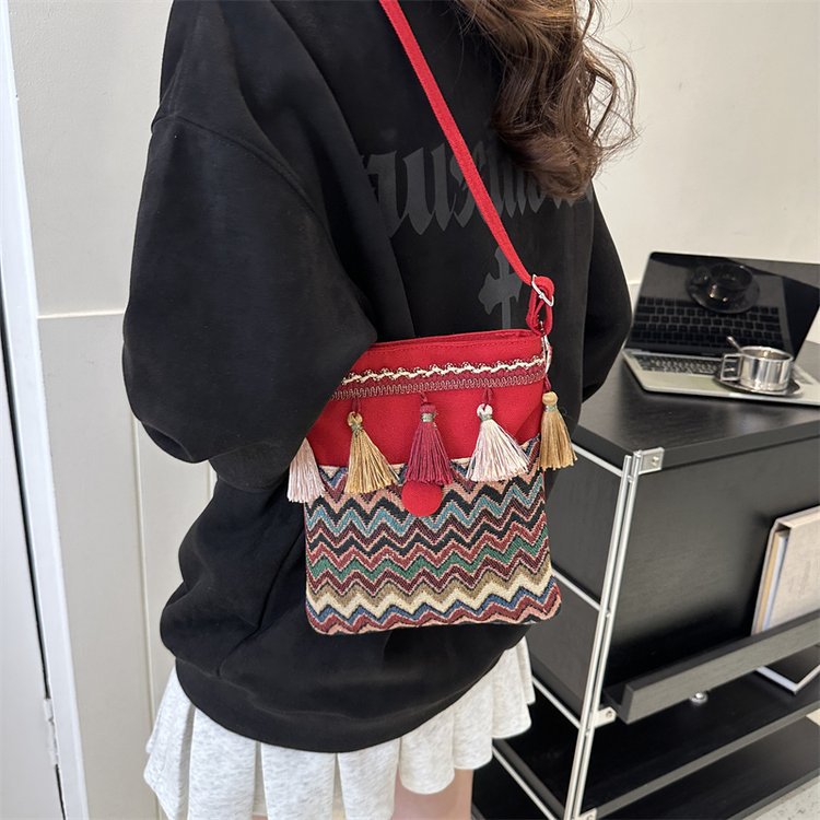 Wholesale Ethnic Style Bohemian Embroidered Tassel Canvas Cross-body Bag