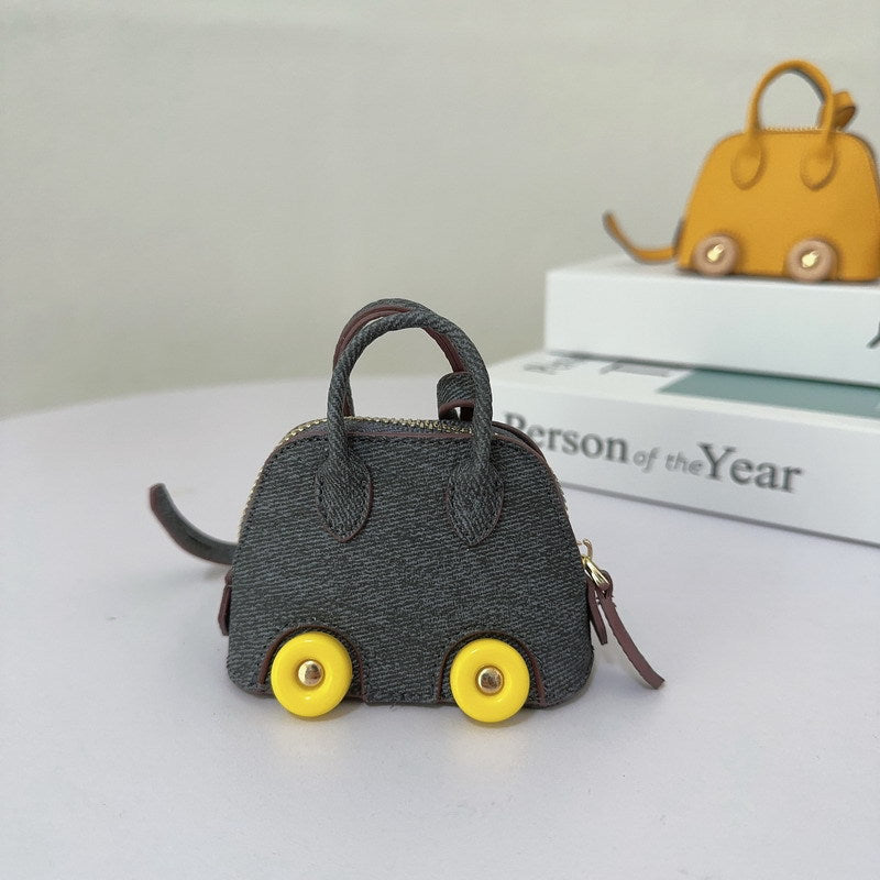 Wholesale Mini wheel shell bag cute lipstick earphone bag