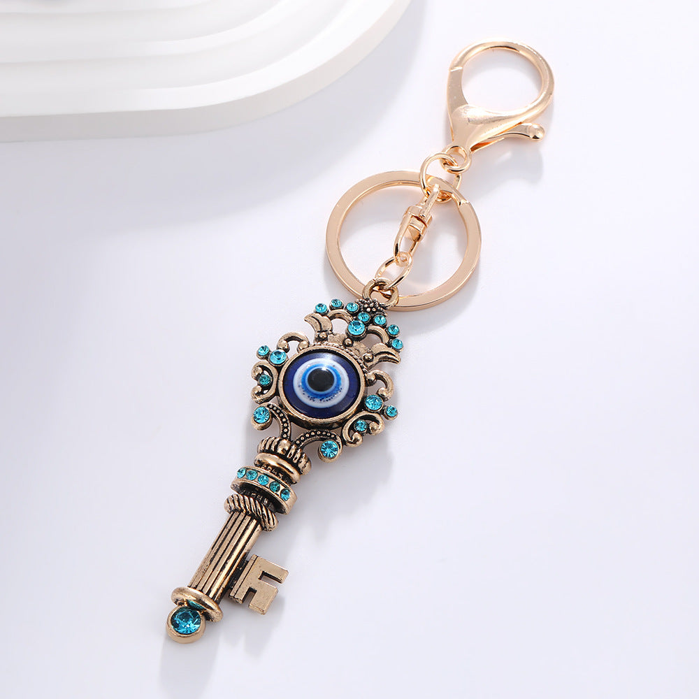 Wholesale Devil' s Eye Key Shape with Water Diamond Metal Keychain