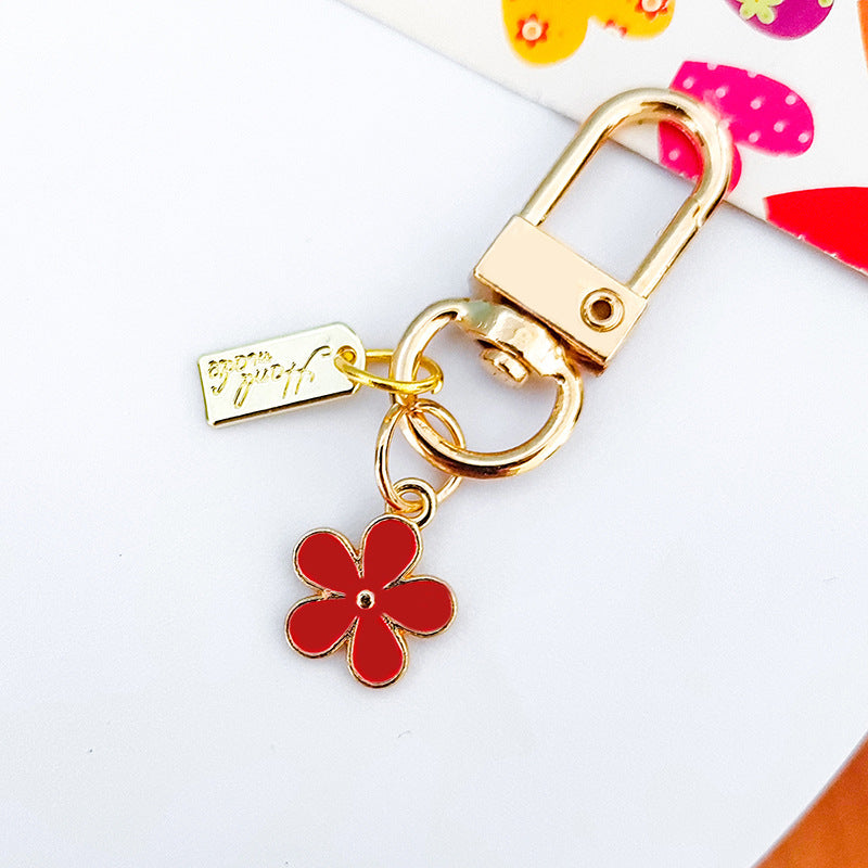 Wholesale Metal Raised Flower Keychains