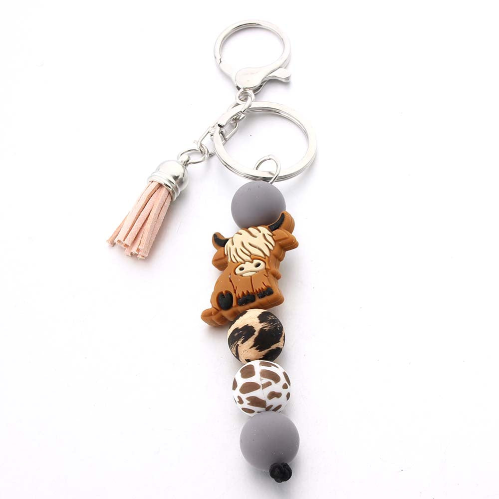 Wholesale Cartoon Cow Tooth Silicone Bead Keychain