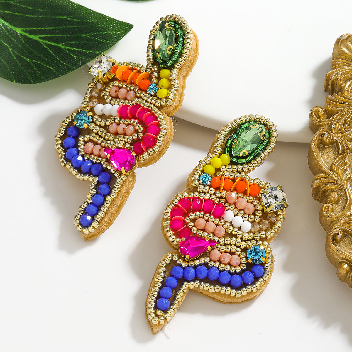 Wholesale snake-shaped hand-woven personalized colorful pearl earrings