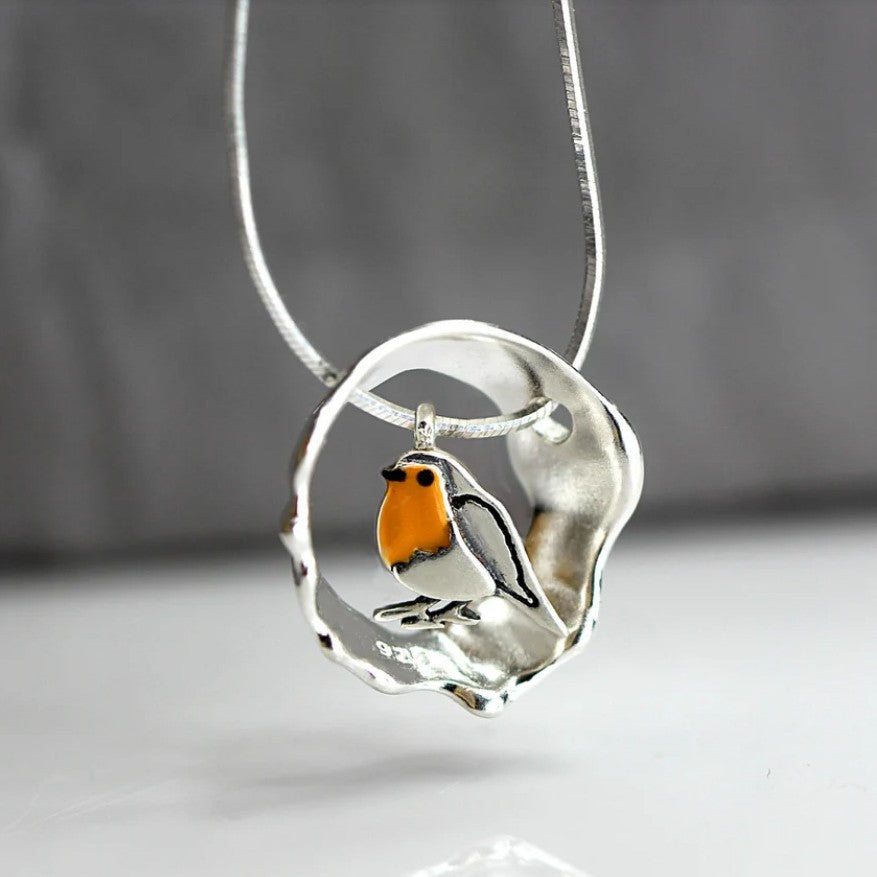 Wholesale Hollow Round Ring Splicing Resin Bird Alloy Pendant Necklace