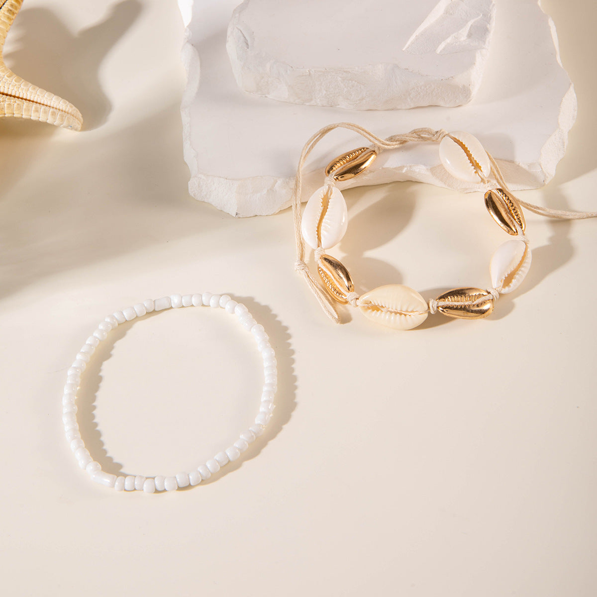 Two pieces of hand-woven anklets from shells