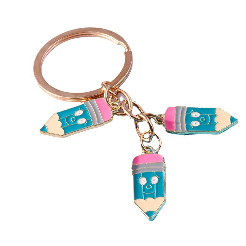 Wholesale Cartoon Crayon Pencil Zinc Alloy Keychain