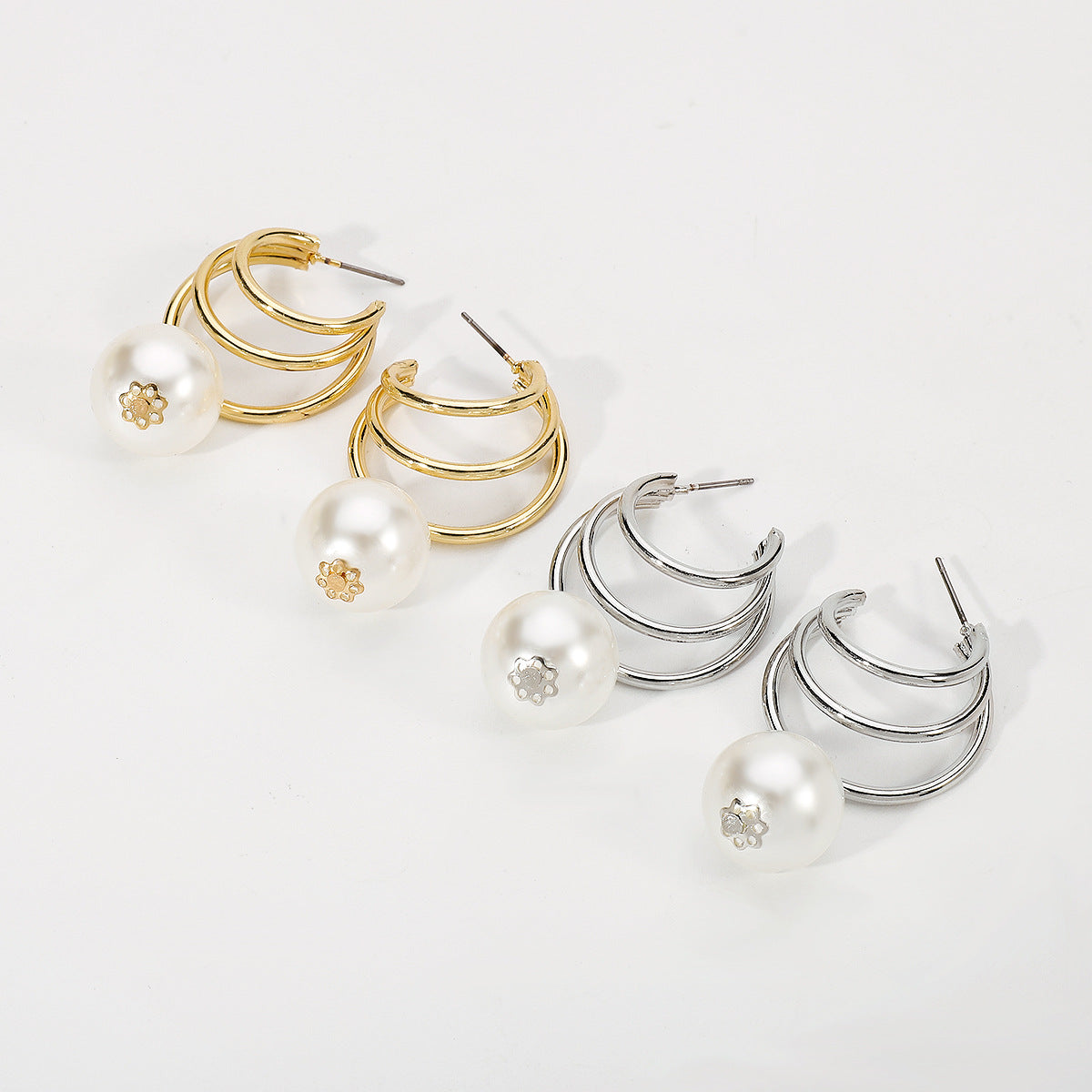 Wholesale Hollow Crescent Shaped Pearl Alloy Earrings