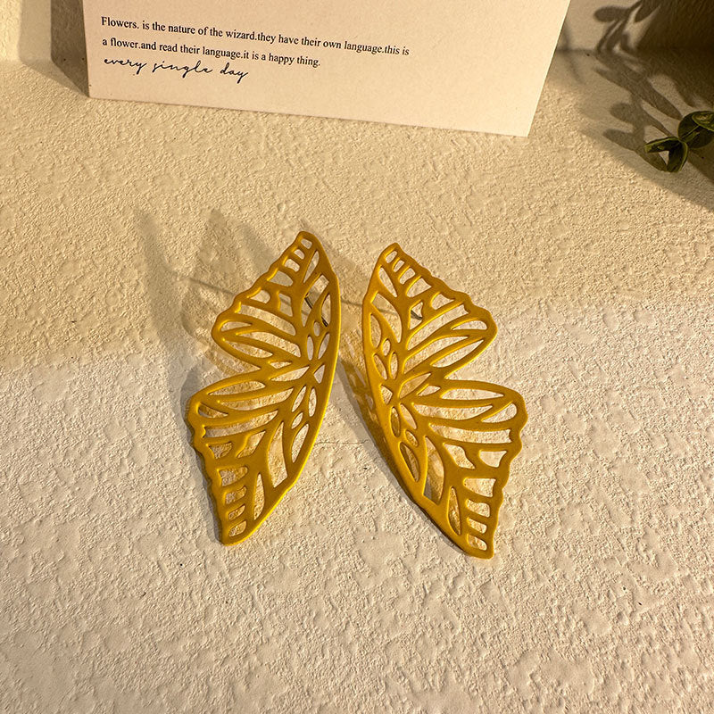 Wholesale Hollow Out Butterfly Solid Color Earrings