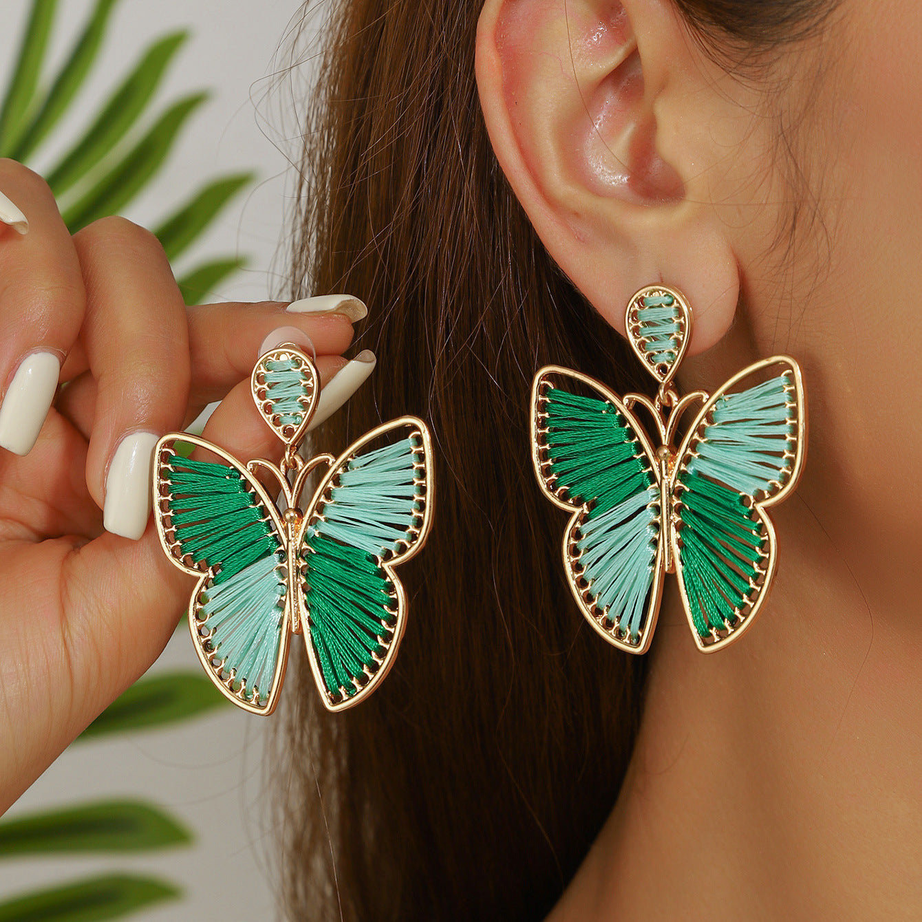 Wholesale Bohemian style hand-woven butterfly earrings