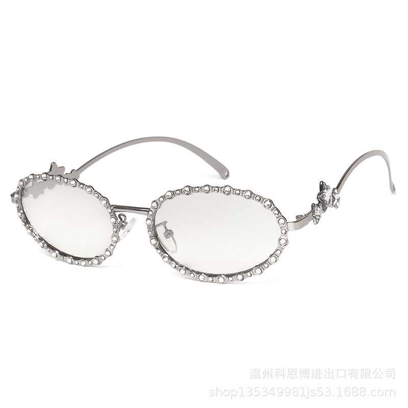 Wholesale Small frame diamond encrusted oval metal pentagram sunglasses