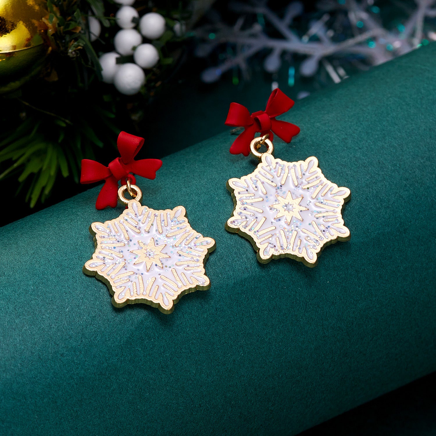 Wholesale Christmas Drip Oil Bow Knot Hollow Snowflake Alloy Earrings