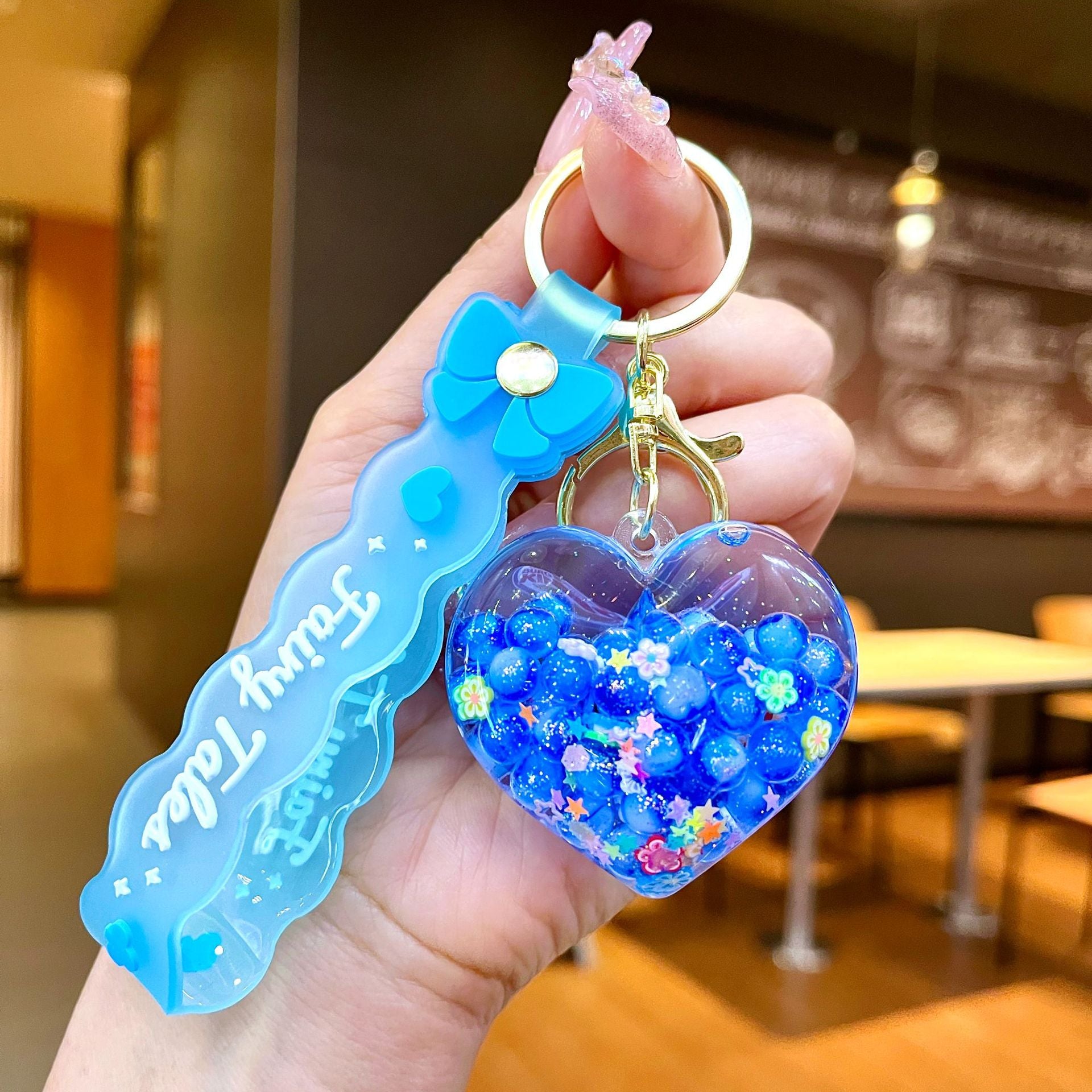 Wholesale Creative Summer Colorful Sand Heart Glow-in-the-Dark Keychain