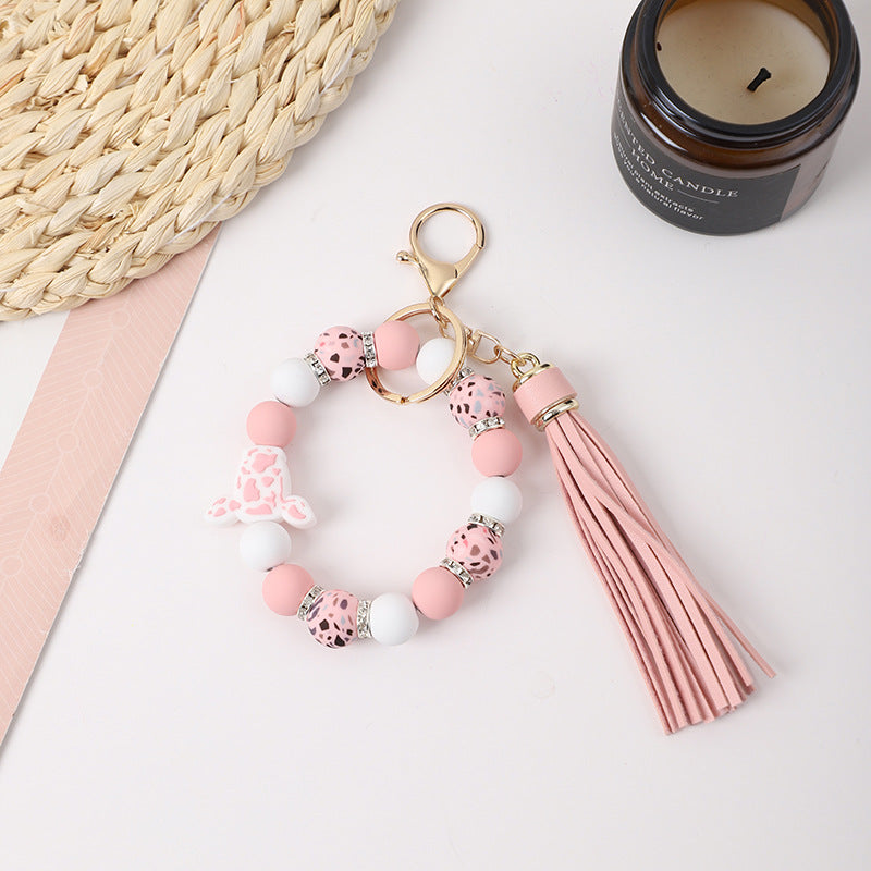 Llavero de muñeca de silicona de borla al por mayor