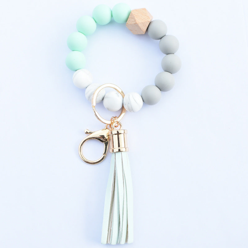 Wholesale Food Grade Silicone Beads Leather Tassel Wood Beads Bracelet Keychain