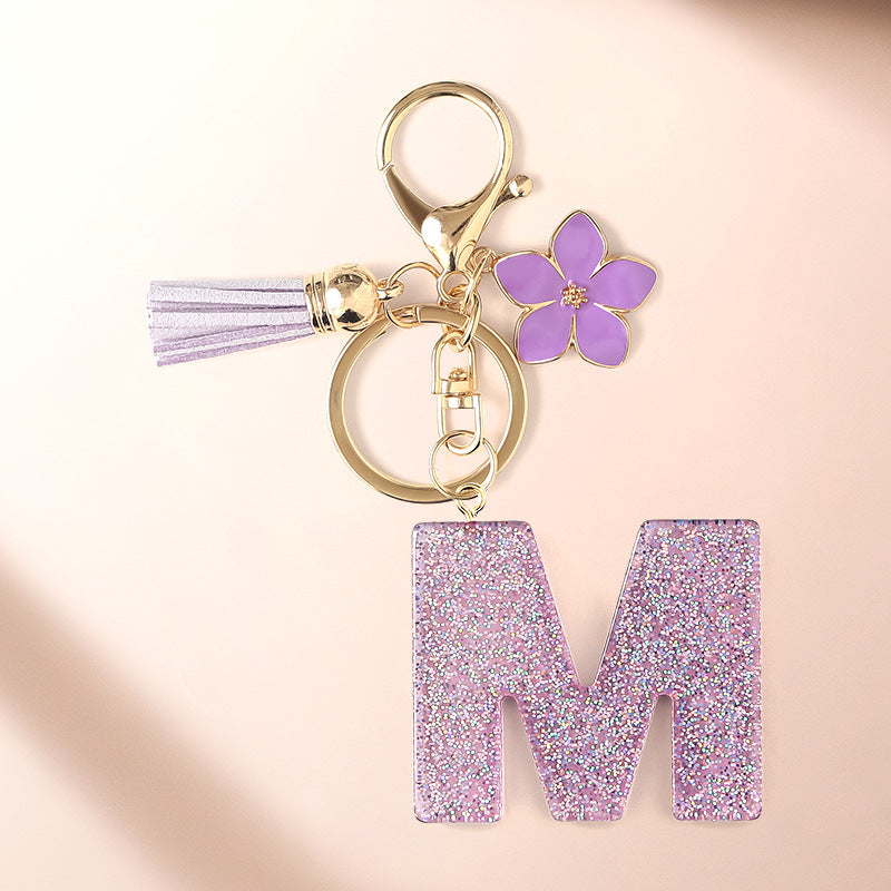 Wholesale Sparkling Pink 26 English Letter Purple Flower Keychain