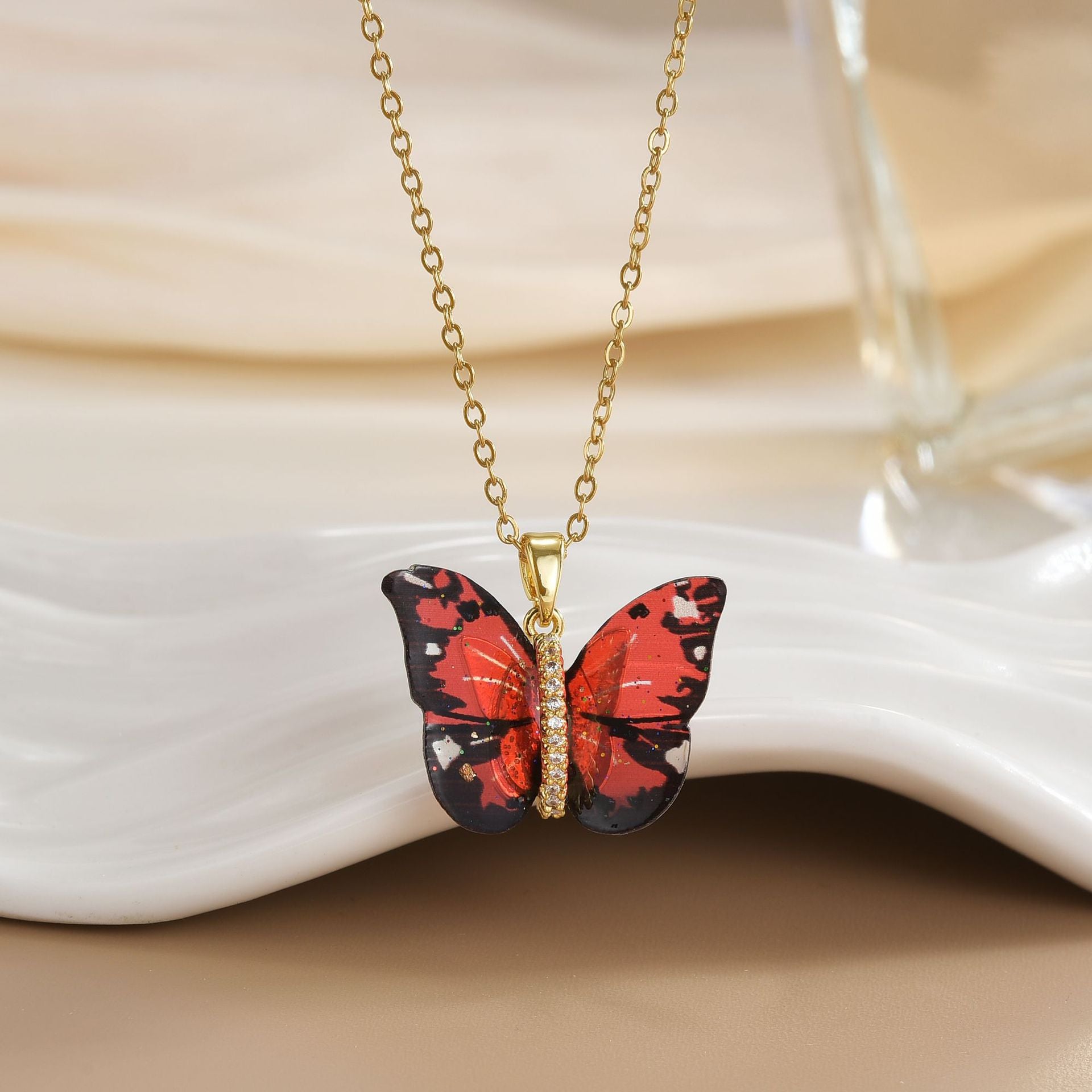 Wholesale Colored resin butterfly titanium steel locking chain