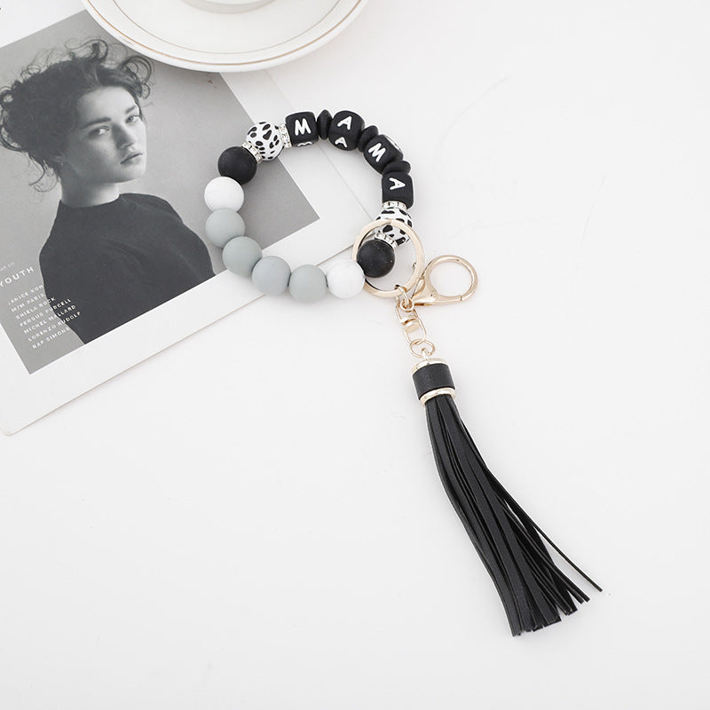 Wholesale 10PCS Silicone Bead Bracelets with Tassel Wood Beads Keychains