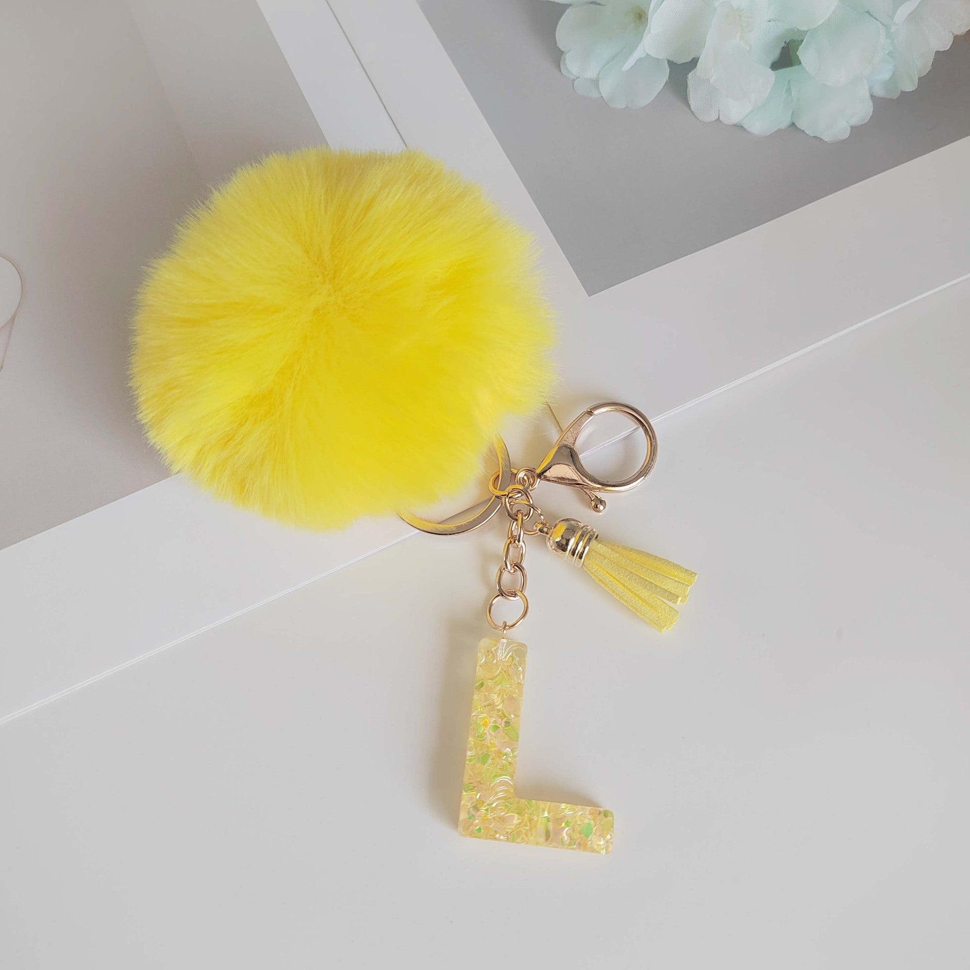 Wholesale Yellow letter ball pendant flower shaped letter keychain