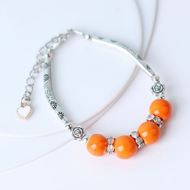 Tubo de curvatura al por mayor cuentas de cerámica pulsera de cuerda hecha a mano