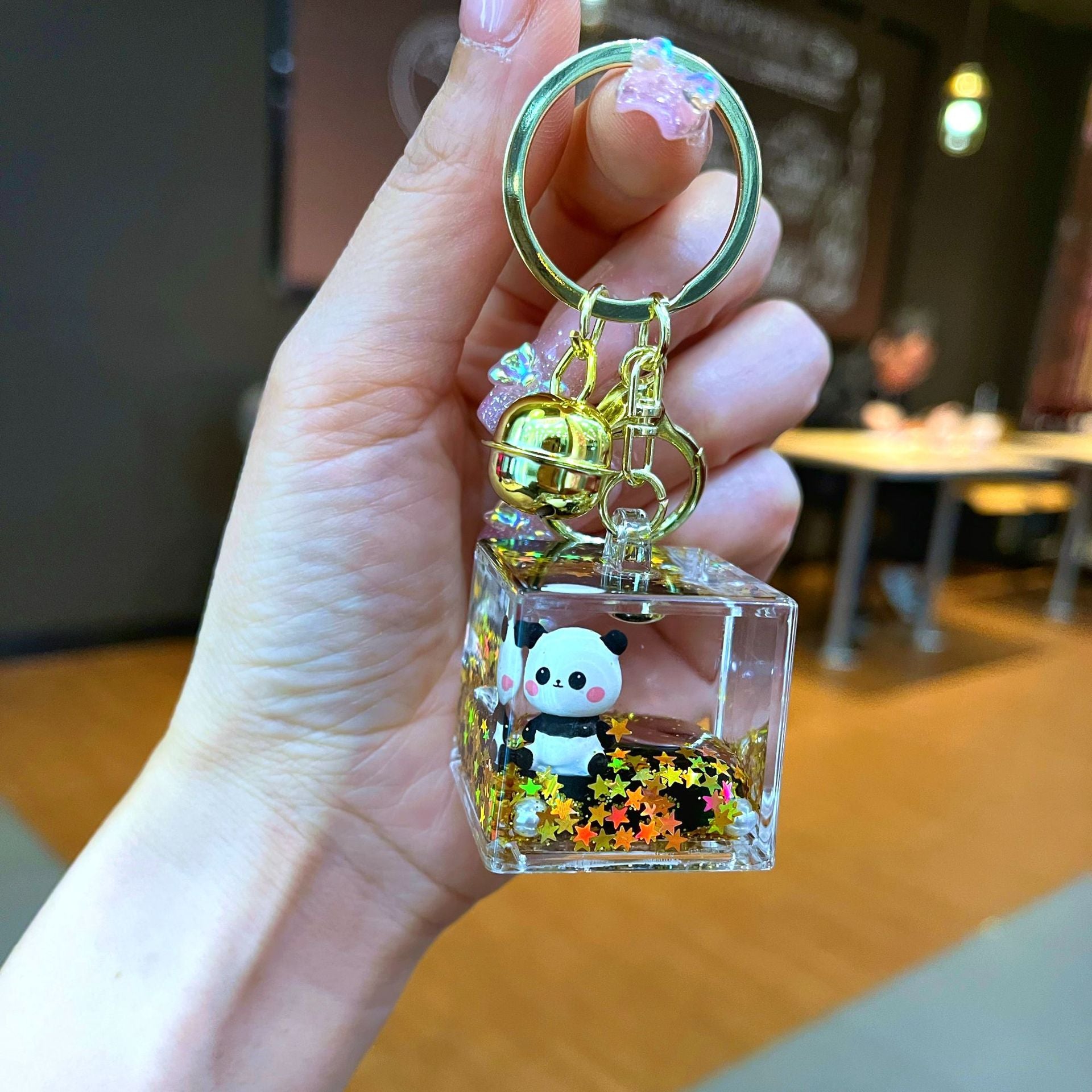 Wholesale Black gold floating cartoon cute panda Liquid Keychains