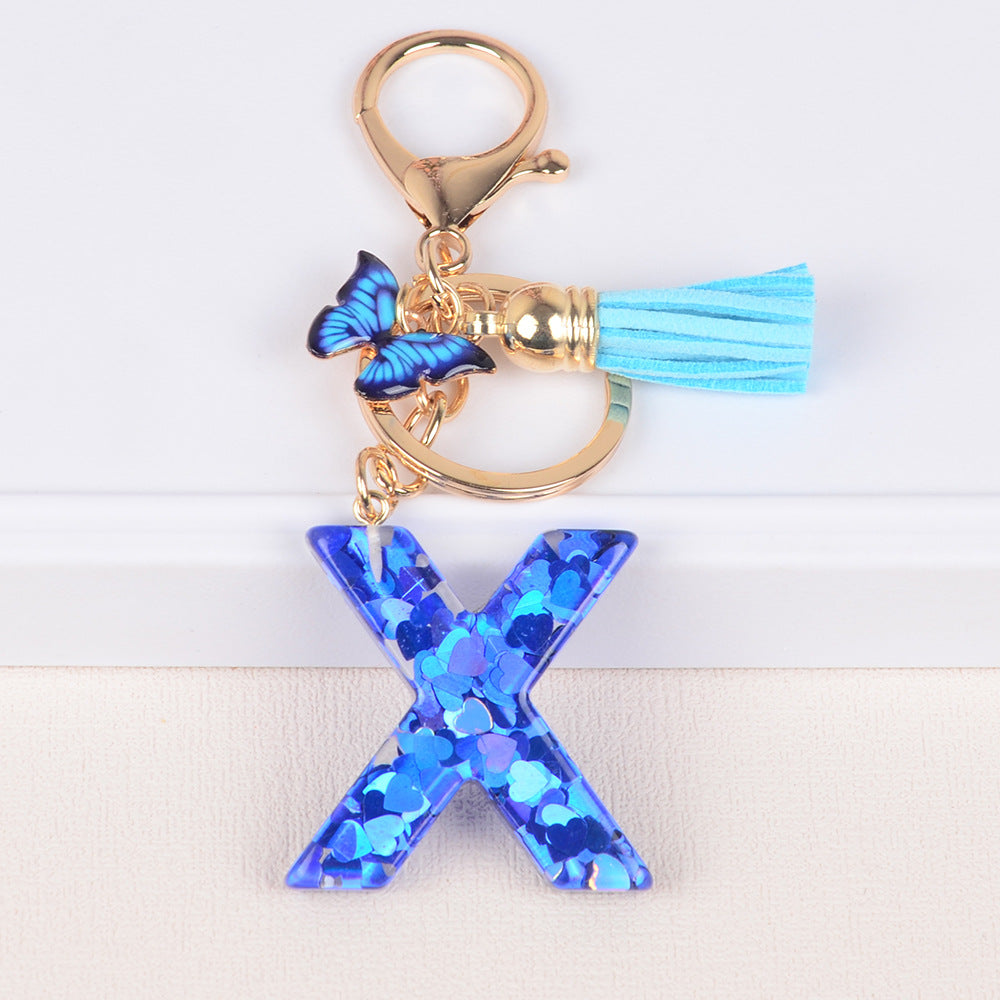 卸売ブルーラブバタフライタッセルレター樹脂キーホルダー
