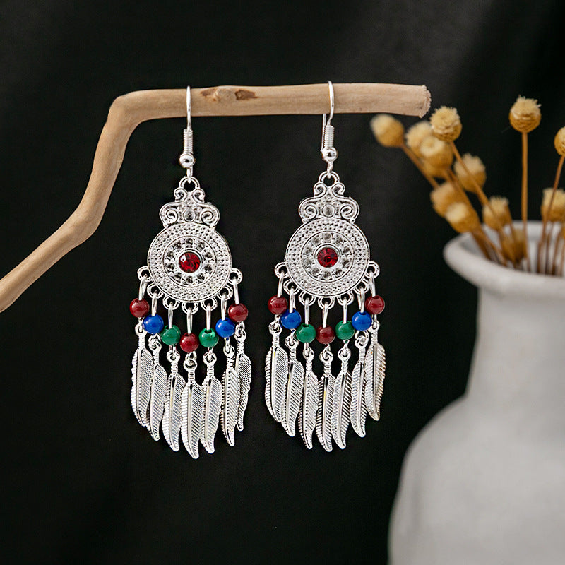 Wholesale Bohemian Ethnic Style Feather Tassel Alloy Earrings