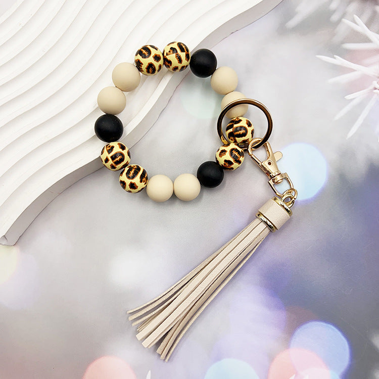Wholesale Leopard Print Wood Beads Silicone Beaded Bracelet Tassel Key Ring