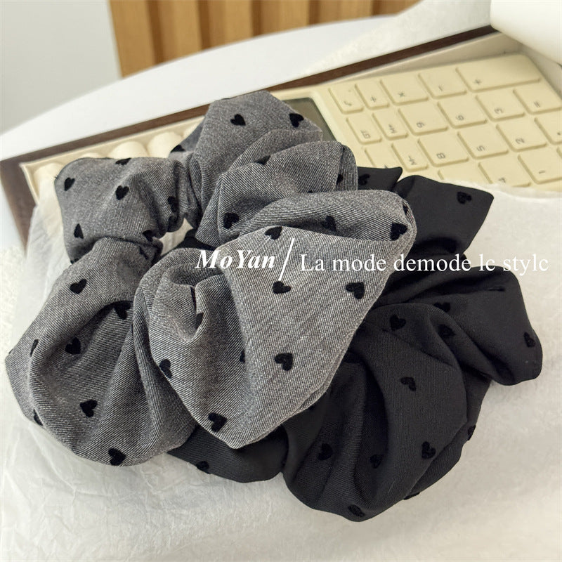 Wholesale Black polka dot bow with heart-shaped elastic headband