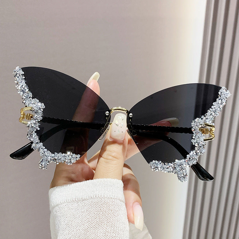 Wholesale Butterfly Shaped Diamond Inlaid Frameless PC Sunglasses