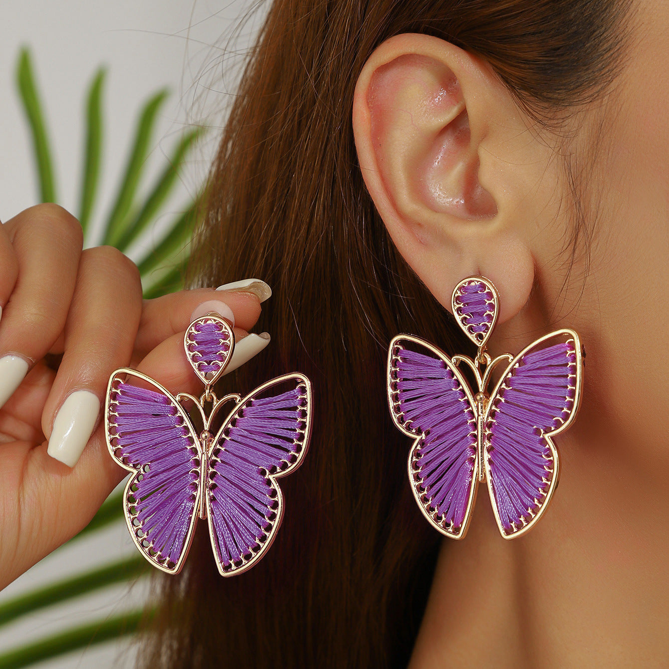 Wholesale Bohemian style hand-woven butterfly earrings