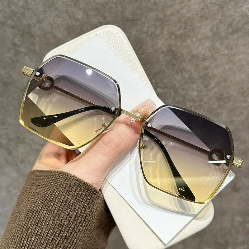 Wholesale Women's Frameless Sunglasses Anti-UV Cyber Celebration Retro Gradient Large Frame Sunglasses