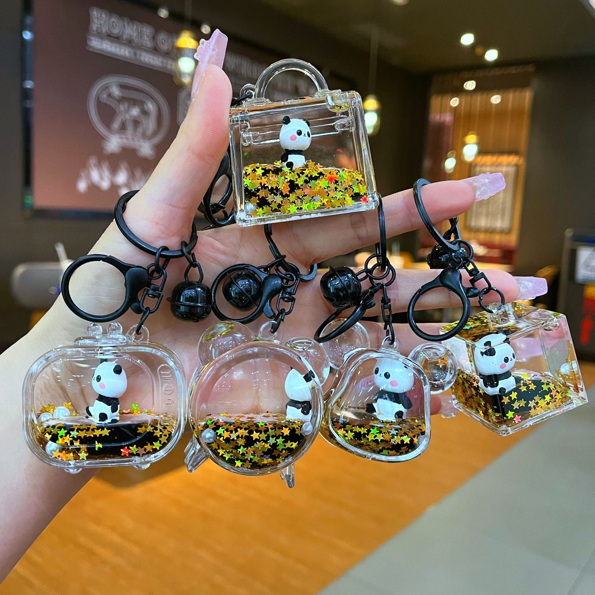 Wholesale Black gold floating cartoon cute panda Liquid Keychains