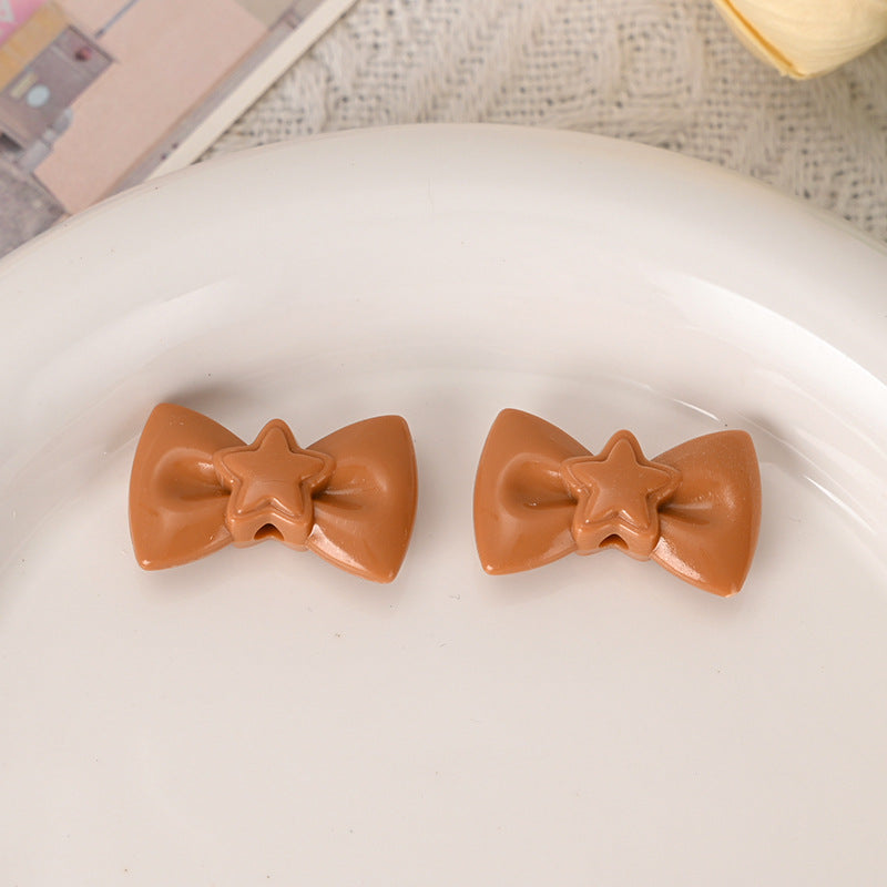 Wholesale  5pcs/pack  cute macaron-colored hollowed-out five-pointed star bow tie beads Acrylic Beads